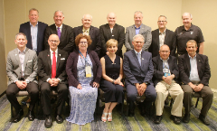 In 2019 in Orlando,: Pete Moore along with past president’s and officers of CoSIDA at that group’s annual convention dinner.